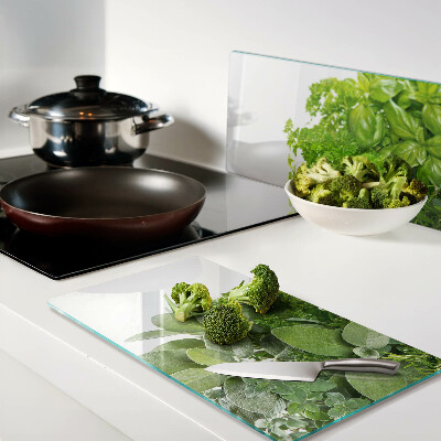 Glass chopping board Green herbs and leaves