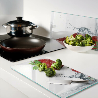 Glass chopping board Strawberries in water