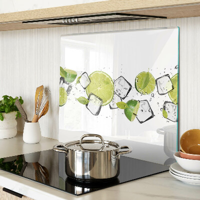 Glass kitchen board Lemons with ice in water