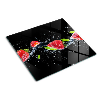 Glass chopping board Strawberries in water