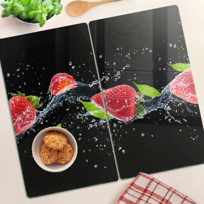 Glass chopping board Strawberries in water