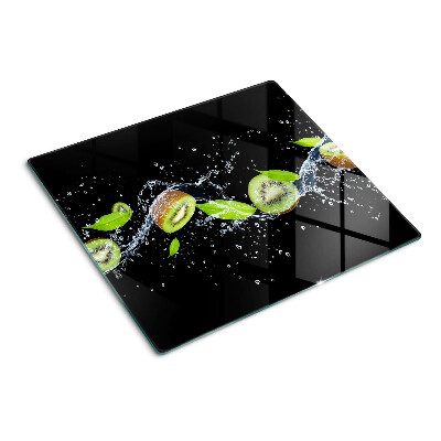 Glass chopping board Kiwi in water with leaves