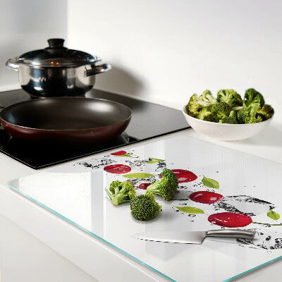 Glass kitchen board Red apples with ice