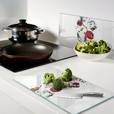 Glass kitchen board Red apples with ice