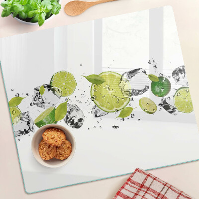 Glass kitchen board Lemons and ice in water