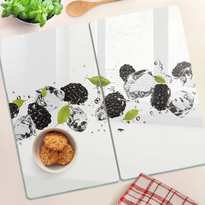 Glass kitchen board Raspberries with leaves and water drops