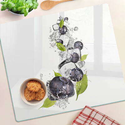 Glass kitchen board Plums in water with leaves