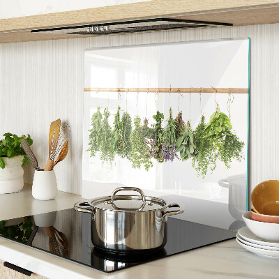Glass chopping board Dried herbs on a string