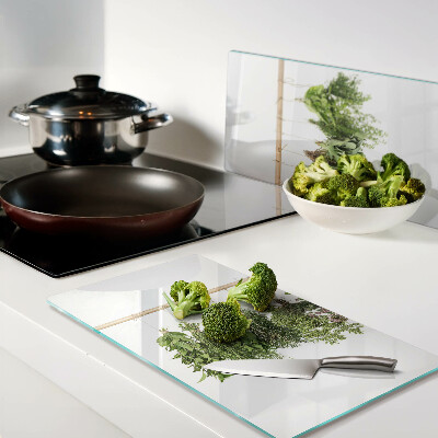 Glass chopping board Dried herbs on a string