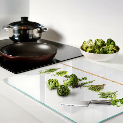 Glass chopping board Herbs dried on a string