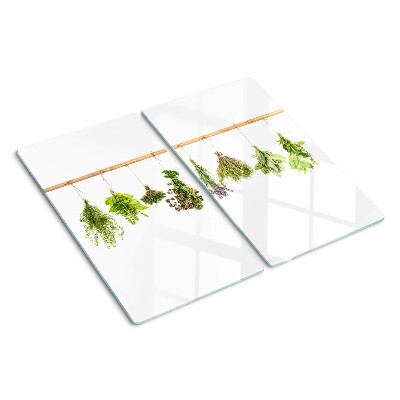 Glass chopping board Herbs dried on a string