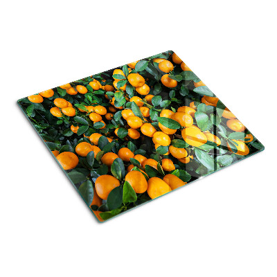 Glass kitchen board Mandarins on the branches
