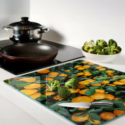 Glass kitchen board Mandarins on the branches