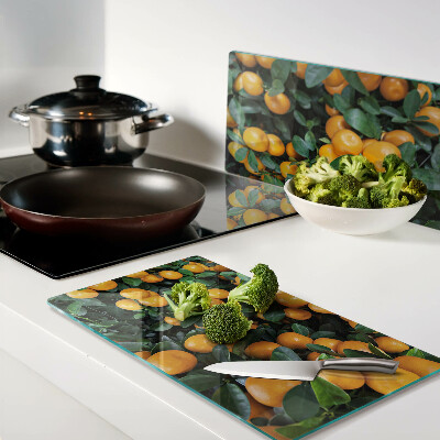 Glass kitchen board Mandarins on the branches