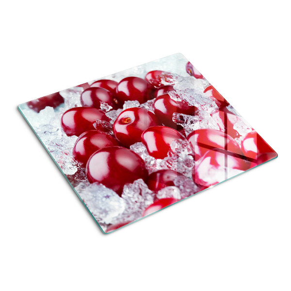 Glass chopping board Red grapes on ice