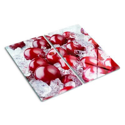 Glass chopping board Red grapes on ice