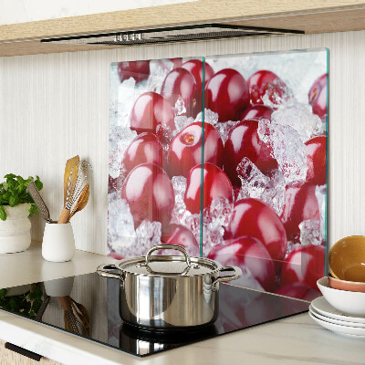 Glass chopping board Red grapes on ice