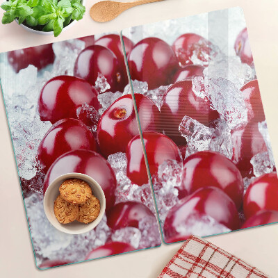 Glass chopping board Red grapes on ice