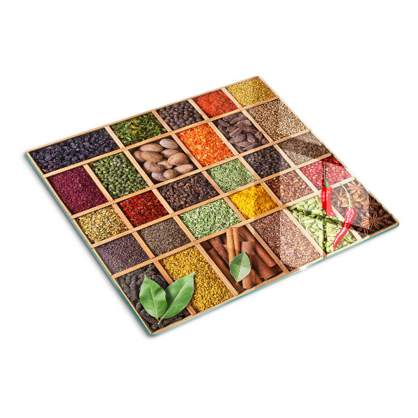 Glass kitchen board Spices in jars