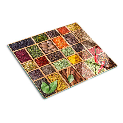 Glass kitchen board Spices in jars