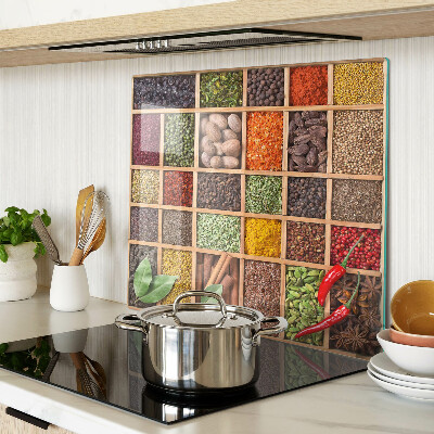 Glass kitchen board Spices in jars