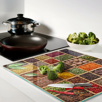 Glass kitchen board Spices in jars