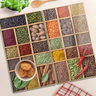 Glass kitchen board Spices in jars
