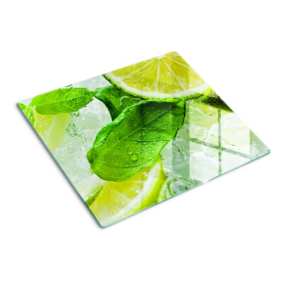 Glass chopping board Lemons and mint leaves