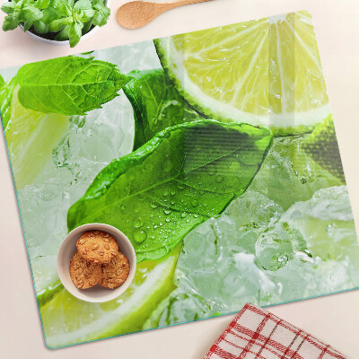 Glass chopping board Lemons and mint leaves