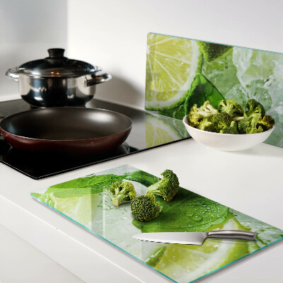 Glass chopping board Lemons and mint leaves