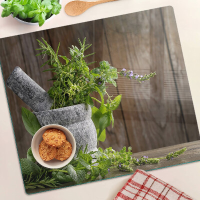 Glass chopping board Herbs in a pot