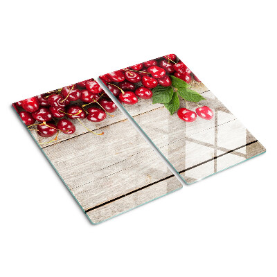 Glass kitchen board Cherries on a wooden background