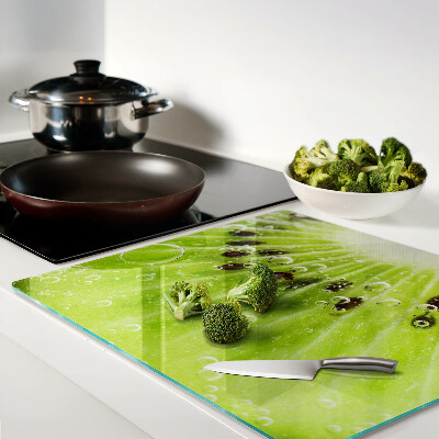 Glass chopping board Kiwi with water drops