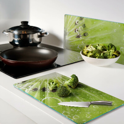 Glass chopping board Kiwi with water drops