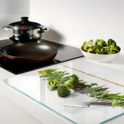 Glass kitchen board Dried herbs on a string