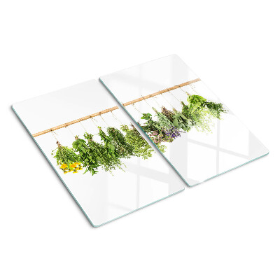 Glass kitchen board Dried herbs on a string
