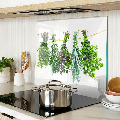 Glass chopping board Dried herbs on a string