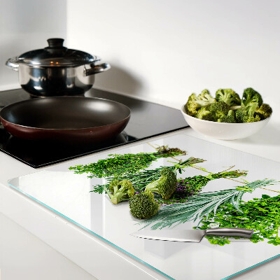 Glass chopping board Dried herbs on a string
