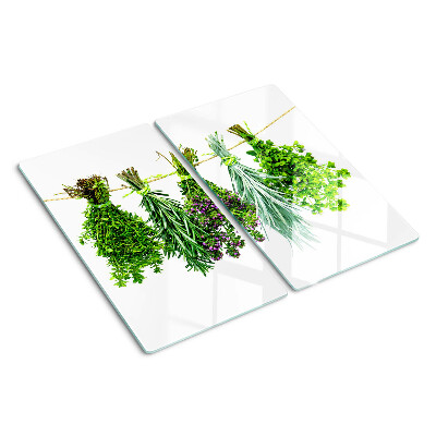 Glass chopping board Dried herbs on a string