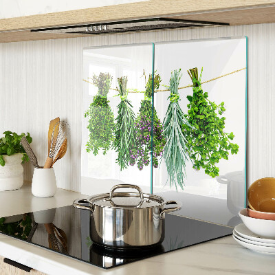 Glass chopping board Dried herbs on a string