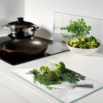 Glass chopping board Dried herbs on a string