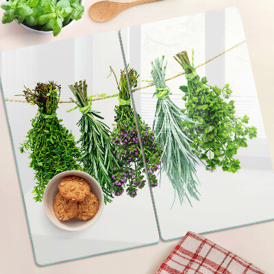 Glass chopping board Dried herbs on a string