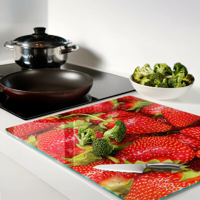 Glass kitchen board Strawberries on the background