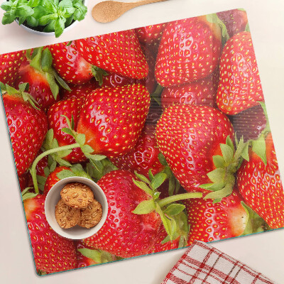Glass kitchen board Strawberries on the background