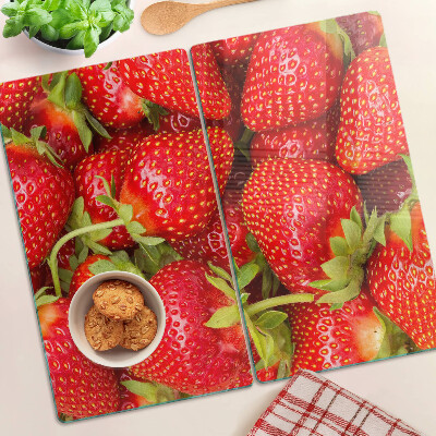 Glass kitchen board Strawberries on the background
