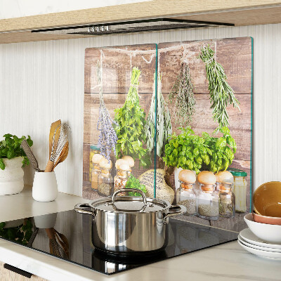 Glass chopping board Herbs and spices in the kitchen