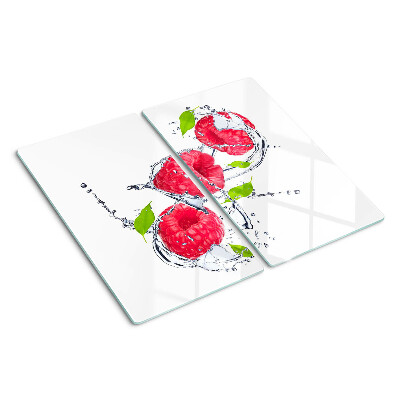 Glass chopping board Raspberries in water with leaves