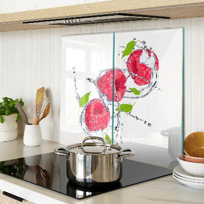 Glass chopping board Raspberries in water with leaves