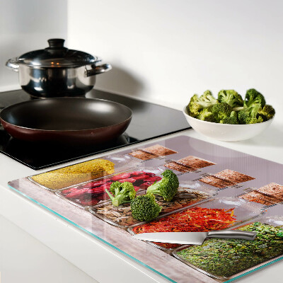 Glass kitchen board Spices in glass jars