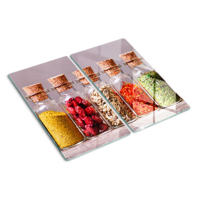 Glass kitchen board Spices in glass jars